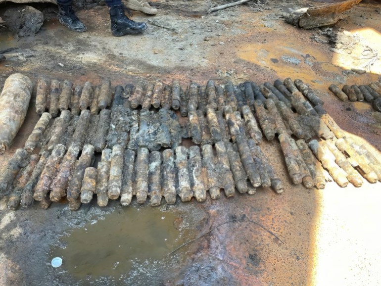 The unexploded shells laid out on the ship