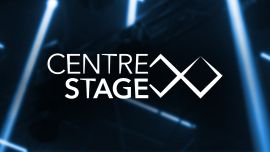 A photo of blue lines on a black background with the words "Centre Stage" in the middle.