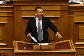 Ilias Kasidiaris, former Golden Dawn member, delivers a speech at the Greek Parliament.