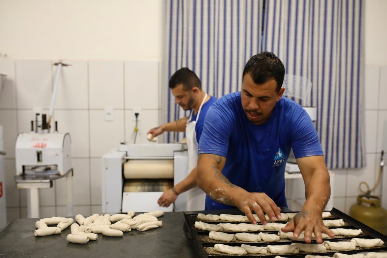 A man in Apac prison prepares "French bread"