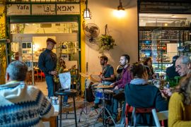 A jazz performance in front of Cafe Yafa one evening