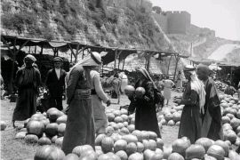 Watermelon market outside Jaffa Gate at the base of the Citadel walls, Jerusalem, 1900 [BMJ]