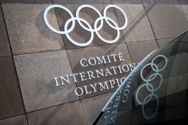 The logo of the International Olympic Committee (IOC) is seen at the sports governing body's headquaters on May 22, 2019 in Pully near Lausanne, on the occasion of a meeting of the IOC executive committee on boxing at the 2020 Olympic Games. - The International Amateur Boxing Federation (AIBA) enters a decisive day for its future as the International Olympic Committee could decide to withdraw it from the 2020 Tokyo Olympics. (Photo by Fabrice COFFRINI / AFP)