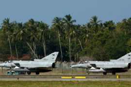 Sri Lankan Air Force&#39;s Kfir fighters prepare to take off at Bandaranaike International Airport, near Colombo on January 2, 2009 [Buddhika Weerasinghe/Reuters]