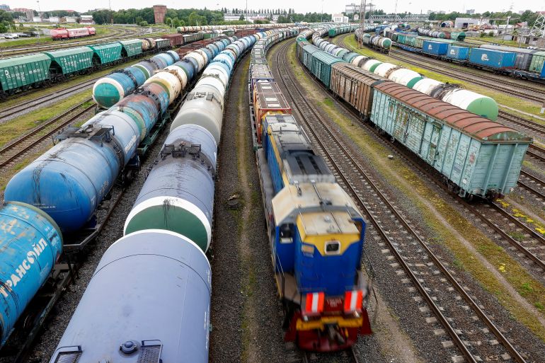 A view shows a freight train and cars, following Lithuania's ban of the transit of goods under EU sanctions through the Russian exclave of Kaliningrad on the Baltic Sea, in Kaliningrad, Russia June 21, 2022. REUTERS/Vitaly Nevar
