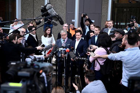 Journalists Nick McKenzie and Chris Masters give a statement outside the Federal Court, in Sydney, Australia June 1, 2023. Military veteran Ben Roberts-Smith committed multiple war crimes including murder while deployed in Afghanistan, a Federal Court judge has found. AAP Image/Dan Himbrechts via REUTERS ATTENTION EDITORS - THIS IMAGE WAS PROVIDED BY A THIRD PARTY. NO RESALES. NO ARCHIVE. AUSTRALIA OUT. NEW ZEALAND OUT.