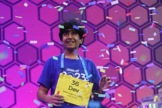 Dev Shah, 14, reacts after winning the Scripps National Spelling Bee competition