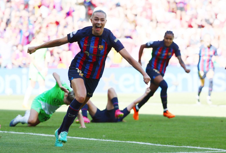 FC Barcelona's Fridolina Rolfo celebrates scoring their third goal. [REUTERS/Yves Herman]