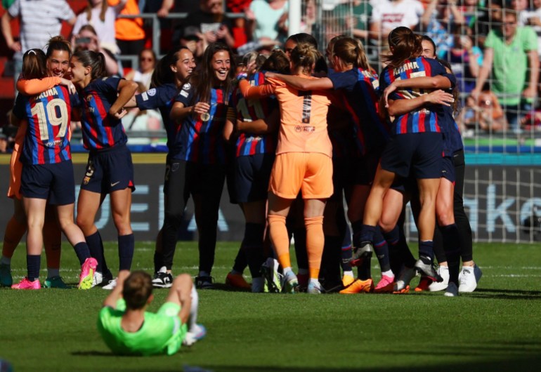 FC Barcelona players celebrate after winning the Women's Champions League Final. [REUTERS/Yves Herman]