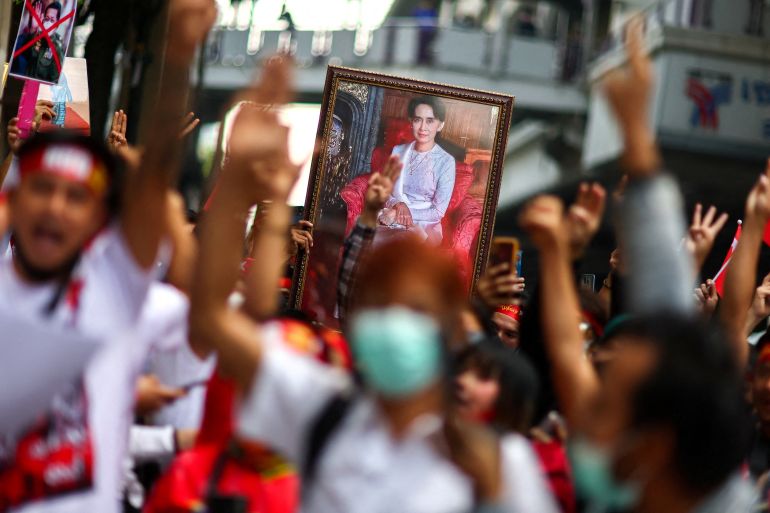 Protesters hold up a portrait of Aung San Suu Kyi during a demonstration to mark the second anniversary of Myanmar's 2021 military coup outside the Myanmar embassy in Bangkok, Thailand, February 1, 2023