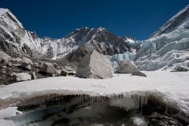 Water forms under Nepal's Khumbu glacier as the ice melts