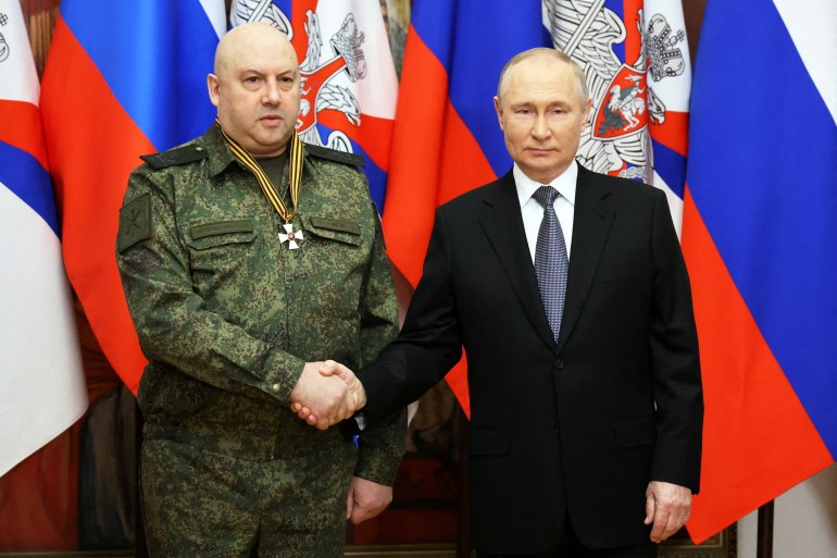 Russian President Vladimir Putin awards General Sergei Surovikin