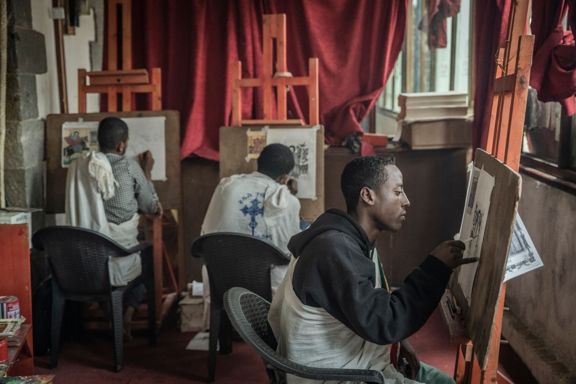 Students of art at the Hamere Berhan initiative are seen training to draw biblical traditional arts