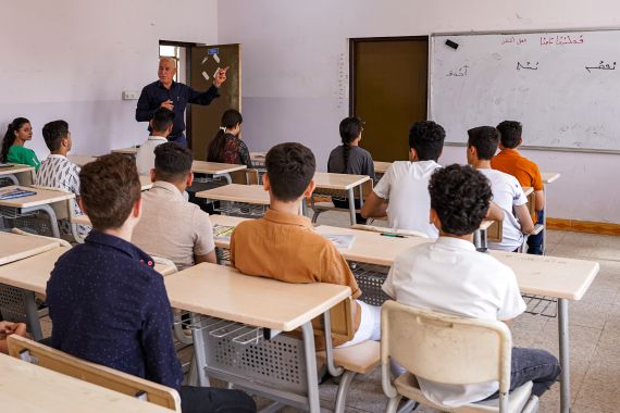 Syriac language teacher Salah Sarkis gives a class at the Ashurbanipal Syriac School in Iraq's predominantly Christian town of Qaraqosh (Baghdeda)