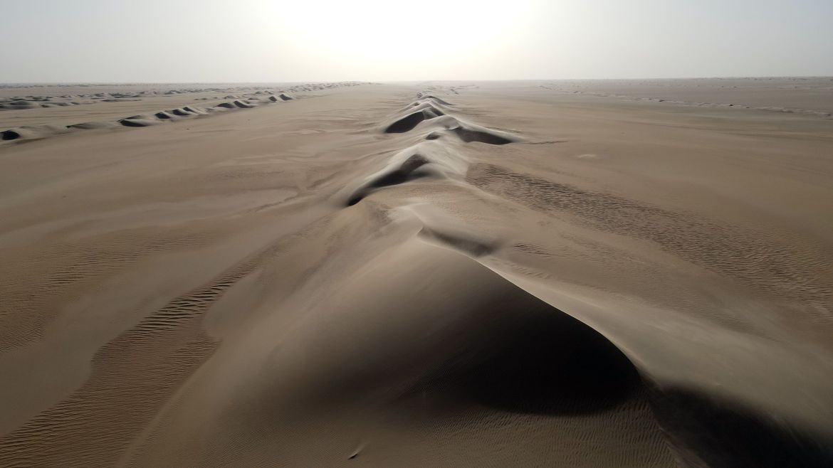 An aerial view of the dunes that encircle the town of Fachi