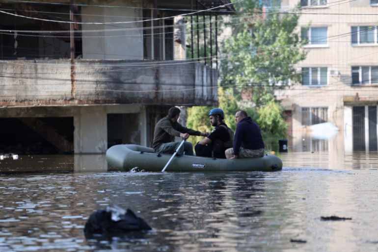 Ukrainian security forces transporting local residents 