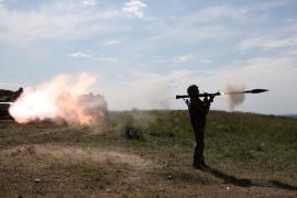 A Ukrainian soldier fires a rocket launcher during a military training exercise near the front line in Donetsk region, Ukraine, on June 8, 2023 [Anatolii Stepanov/AFP]