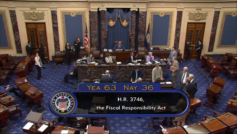 A view of the Senate taken from television shows the final vote tally of 63-36