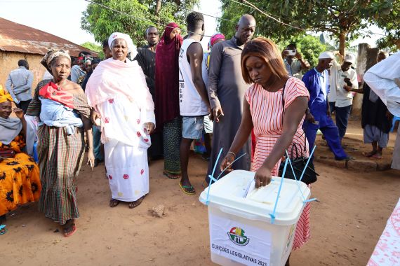 People line up to cast their ballots in Guinea-Bissau's legislative elections in Bissau Sunday June 4, 2023.