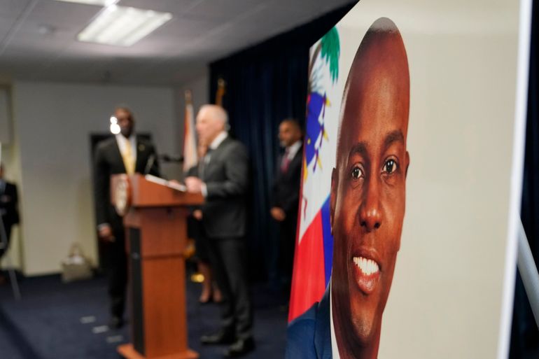 A picture of Haitian President Jovenel Moise is displayed at a US news conference
