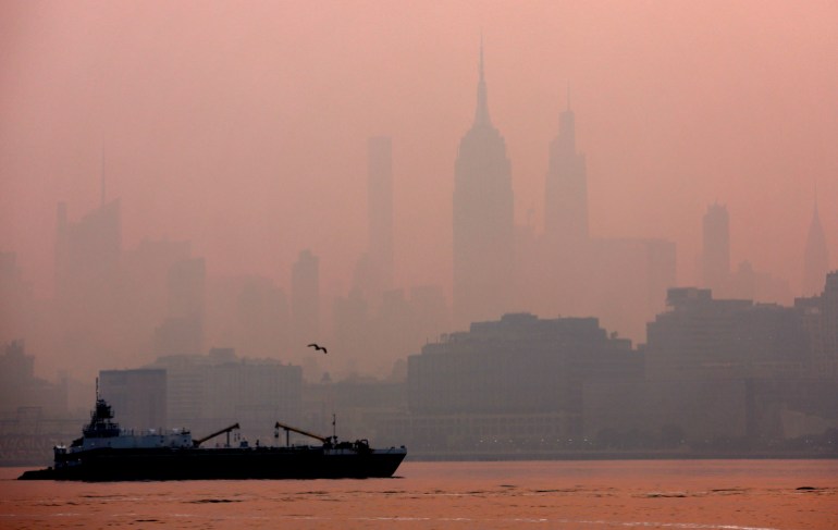 A haze of smoke covers the NYC skyline