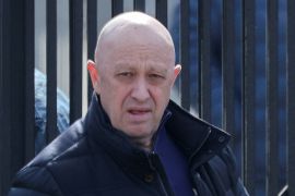 Founder of Wagner private mercenary group Yevgeny Prigozhin leaves a cemetery before the funeral of a Russian military blogger who was killed in a bomb attack in a St Petersburg cafe,