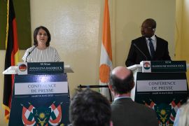 German Foreign Minister Annalena Baerbock (L) speaks during a joint press conference with Niger's Chief of Diplomacy Hassoumi Massoudou (R) in Niamey on April 14, 2022