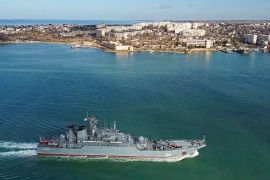 In this handout photo released by Russian Defense Ministry Press Service on Thursday, Feb. 10, 2022, The Russian navy's amphibious assault ship Kaliningrad sails into the Sevastopol harbor in Crimea. The Russian navy has sent six amphibious assault ships into the Black Sea as part of a buildup of forces near Ukraine that stoked Western fears of an invasion. (Russian Defense Ministry Press Service via AP)