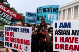 Demonstrators protest outside of the Supreme Court in Washington, Thursday, June 29, 2023, after the Supreme Court struck down affirmative action in college admissions, saying race cannot be a factor. Days after the Supreme Court outlawed affirmative action in college admissions, activists say they will sue Harvard over its use of legacy preferences for children of alumni.