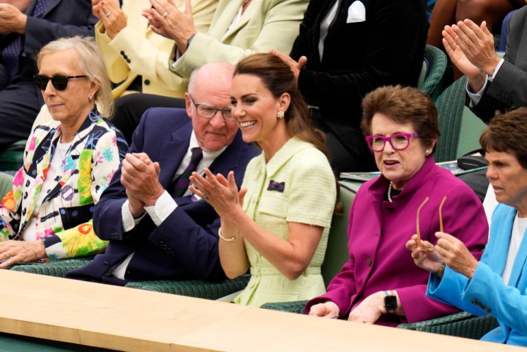 Kate, Princess of Wales sits in the Royal Box with tennis legends Billie Jean King, second rightAP Photo/Kirsty Wigglesworth)