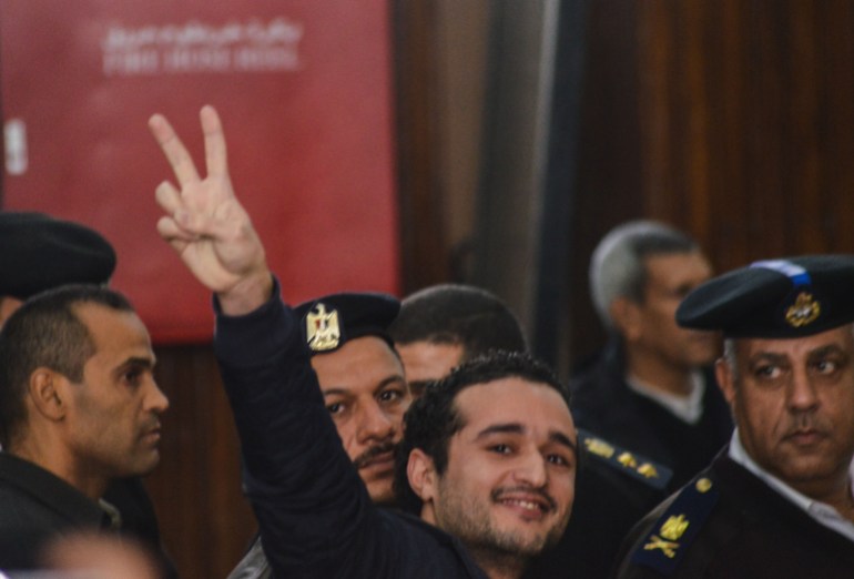 Leading Egyptian opposition campaigner Ahmed Douma listens to the verdict in court during his trial