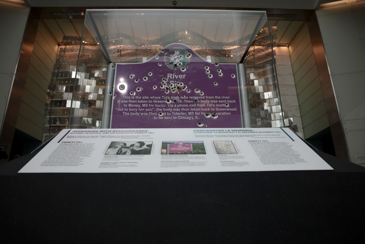 A sign marking where Emmet Till’s body was recovered is displayed in the entryway of the Smithsonian Museum of American History