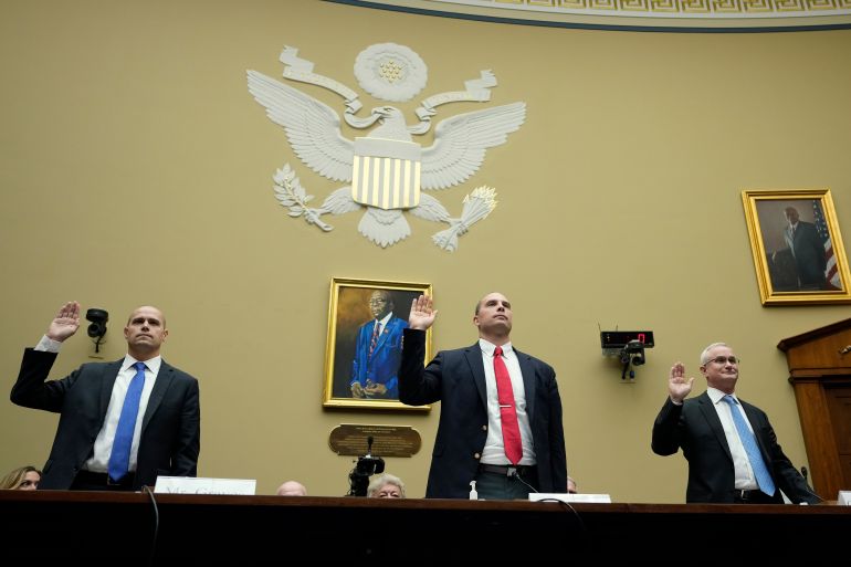 WASHINGTON, DC - JULY 26: Ryan Graves, executive director of Americans for Safe Aerospace, David Grusch, former National Reconnaissance Officer Representative of Unidentified Anomalous Phenomena Task Force at the U.S. Department of Defense, and Retired Navy Commander David Fravor are sworn-in during a House Oversight Committee hearing titled Unidentified Anomalous Phenomena: Implications on National Security, Public Safety, and Government Transparency on Capitol Hill 26, 2023 in Washington, DC. Several witnesses are testifying about their experience with possible UFO encounters and discussion about a potential covert government program concerning debris from crashed, non-human origin spacecraft. Drew Angerer/Getty Images/AFP (Photo by Drew Angerer / GETTY IMAGES NORTH AMERICA / Getty Images via AFP)