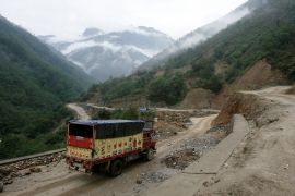 A liquefied petroleum gas (LPG) delivery truck drives along India's Tezpur-Tawang highway which runs to the Chinese border, in the northeastern Indian state of Arunachal Pradesh May 29, 2012.