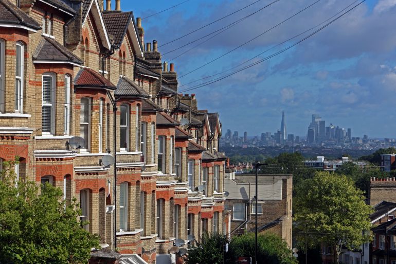 Buildings in the City of London are seen alongside Victorian residential housing in South London