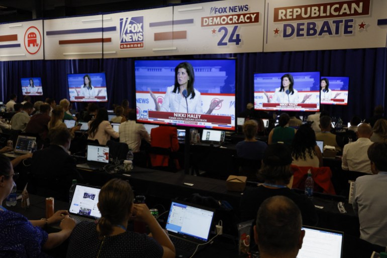 Nikki Haley is seen on screens during the Republican debate