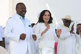 Gabon President Ali Bongo Ondimba, left, and Gabon First Lady Sylvia Bongo Ondimba. second left, are seen at the Nzang Ayong stadium in Libreville on July 10, 2023 [Steeve Jordan/AFP]