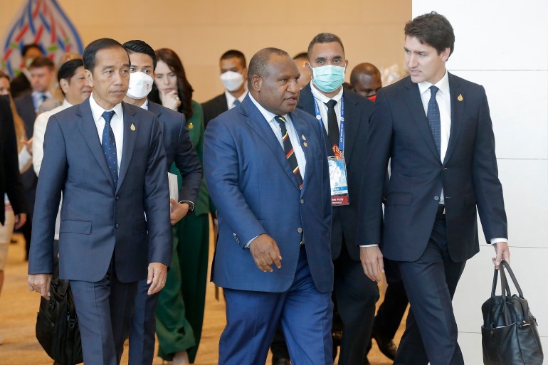 Left to right; Indonesia's President Joko Widodo, Papua New Guinea Prime Minister James Marape and Canadian Prime Minister Justin Trudeau at the APEC summit, Friday, Nov. 18, 2022, in Bangkok, Thailand. A decades-long conflict between Indonesia’s military and separatist rebels in Papua, a province that borders Papua New Guinea, has for long shadowed Jakarta’s relations with Pacific Island nations (Diego Azubel/Pool Photo via AP)