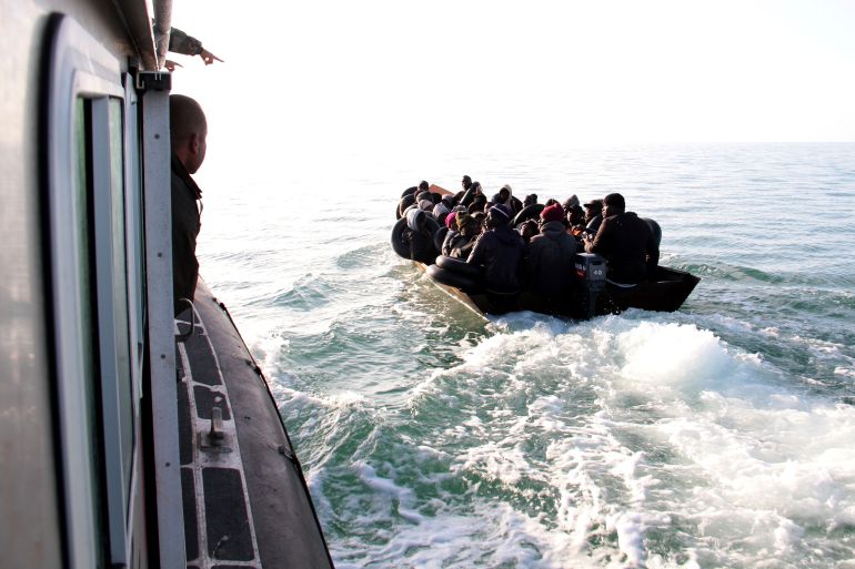 Migrants, mainly from sub-Saharan Africa, are stopped by Tunisian Maritime National Guard at sea during an attempt to get to Italy, near the coast of Sfax, Tunisia