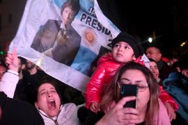 Followers of Argentina presidential candidate Javier Milei react after he garnered the most support in primaries