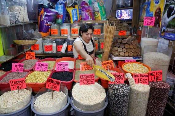 Sacks of different varieties of corn grain are displayed at a market in Mexico City, Mexico