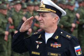 Commander of the Russian Black Sea Fleet Vice-Admiral Viktor Sokolov salutes during a send-off ceremony for reservists drafted during partial mobilisation, in Sevastopol, Crimea September 27, 2022. REUTERS/Alexey Pavlishak
