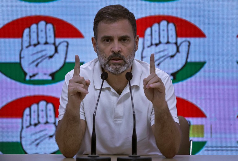 Rahul Gandhi, a senior leader of India's main opposition Congress party, gestures as he addresses the media in New Delhi