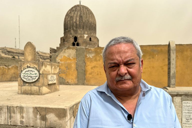 Hisham Kassem, a former newspaper publisher publisher and political activist, speaks during an interview with Reuters TV at his family's cemetery, in Cairo
