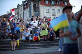 People attend an event for the anniversary of Ukraine&#39;s Independence Day in Warsaw, Poland, August 24, 2023 [Kacper Pempel/Reuters]