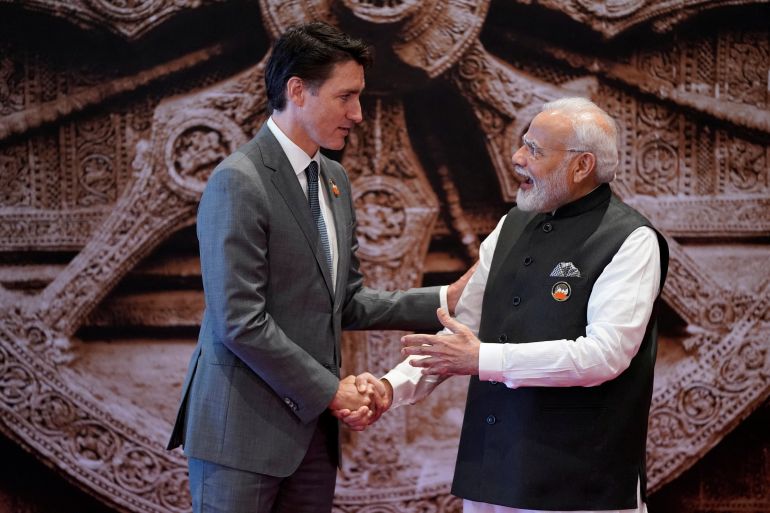 Canadian Prime Minister Justin Trudeau shakes hands with Indian counterpart Narendra Modi at G20 summit in New Delhi