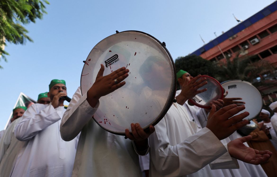 Sufi Muslims chant and march to celebrate "Mawlid al-Nabawi", or the birth of Prophet Mohammad, in Al Azhar district, Old Cairo, Egypt, September 27, 2023. REUTERS/Amr Abdallah Dalsh