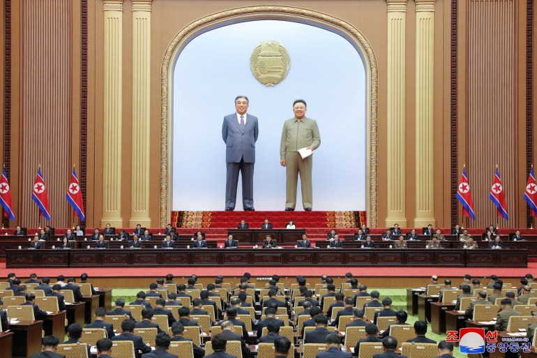 The 9th Session of the 14th Supreme People's Assembly of the Democratic People's Republic of Korea is held at the Mansudae Assembly Hall, in Pyongyang, North Korea, in this picture obtained by Reuters on September 28, 2023. Two massive images of North Korea's historic leaders — Kim Jong Il and Kim Il Sung — sit in front of the rows of parliament representatives.