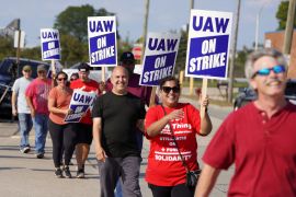 Thousands of autoworkers across 20 US states have walked off the job to push for wage increases, shorter hours and improved retirement benefits [File: Dieu-Nalio Chery/Reuters]