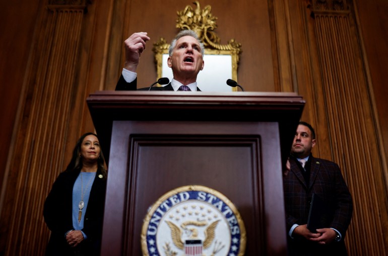 U.S. House Speaker Kevin McCarthy (R-CA) speaks to reporters about a looming shutdown of the U.S. government at the U.S. Capitol in Washington, U.S., September 29, 2023. He speaks from behind a podium emblazoned with a government seal.